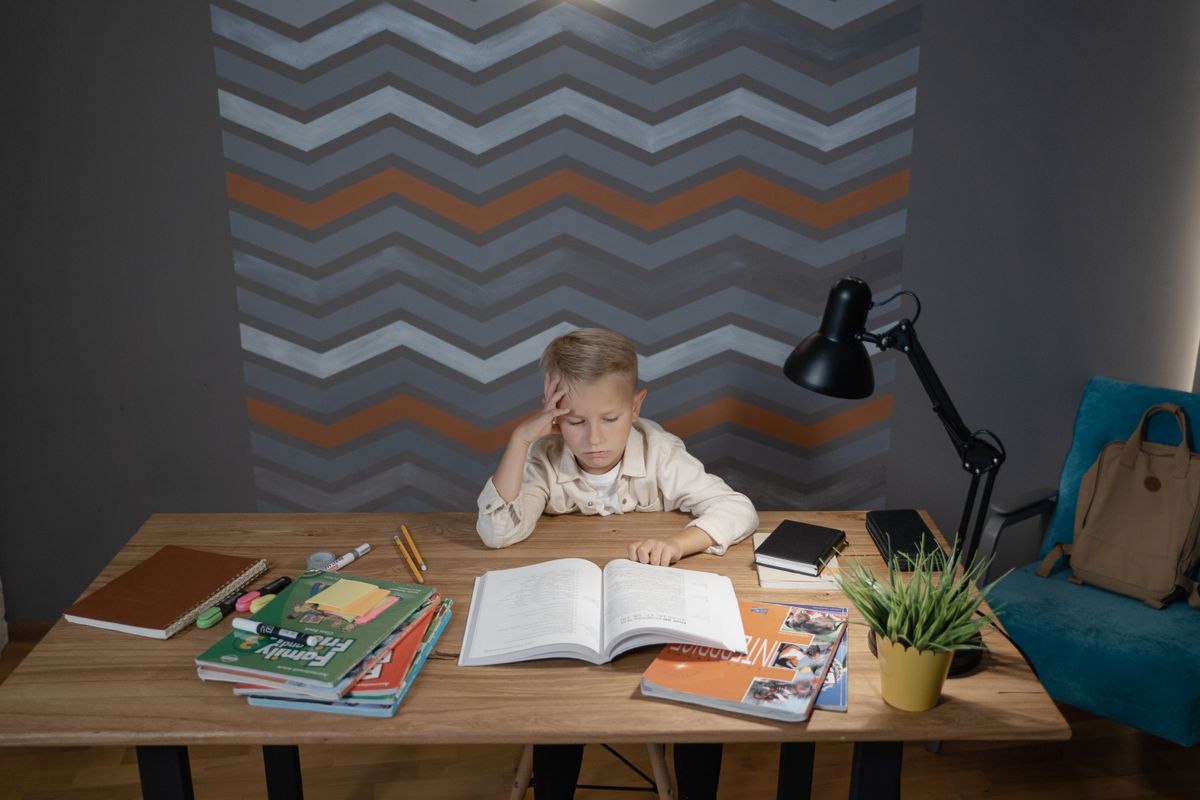 Homeschool desk with open books and learning materials