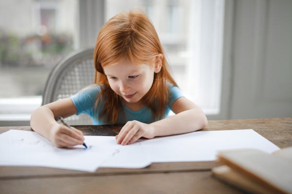 Children doing summer learning activities outdoors