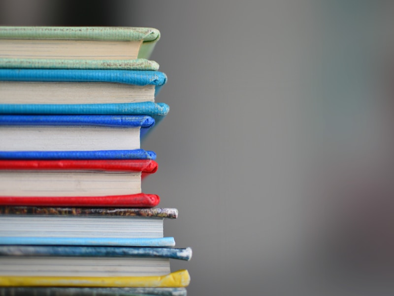 Grammar textbook open on a desk with study notes