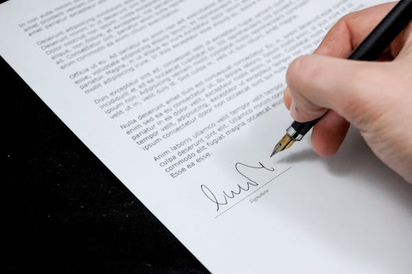 Document with pen representing the study of government and constitutional documents