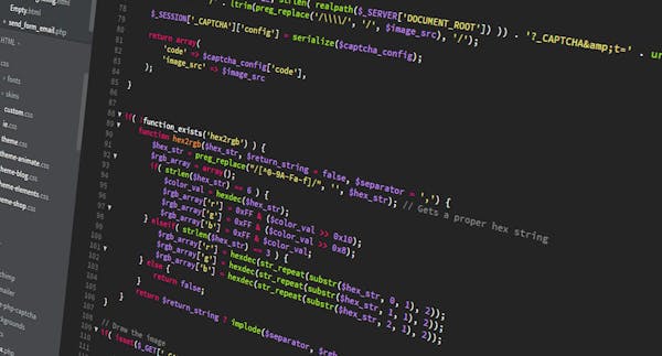 JavaScript code displayed on a monitor